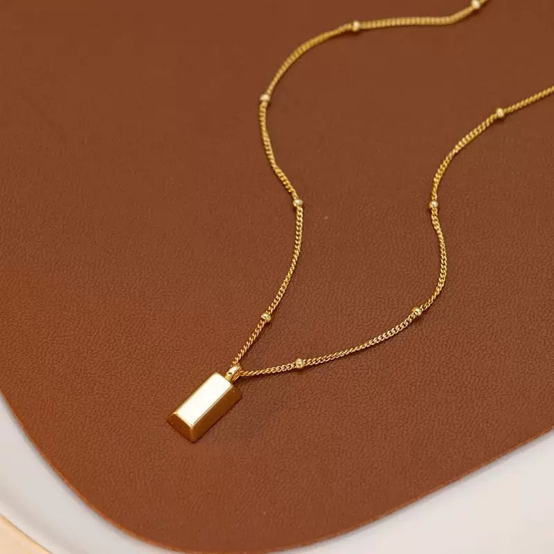 14K Gold Bar Necklace--A Symbol of Ambition & Value