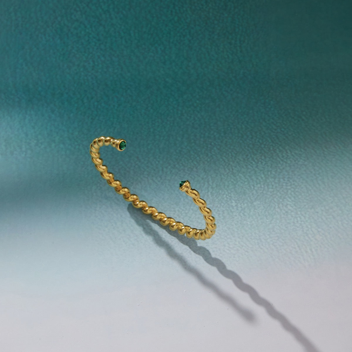 Twist Cuff Bracelet – Emerald Accent