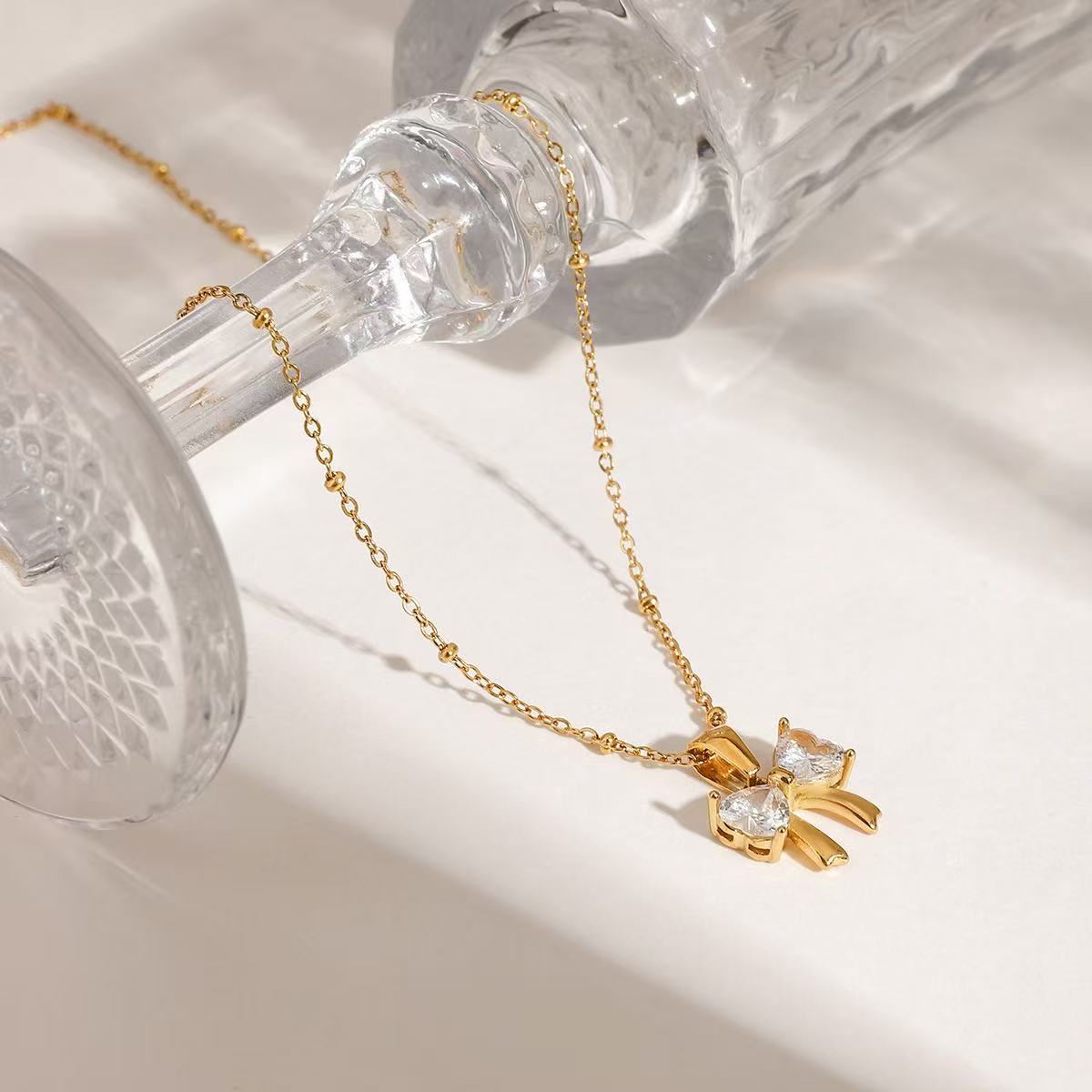 14K Gold Elegant Bow Pendant Necklace