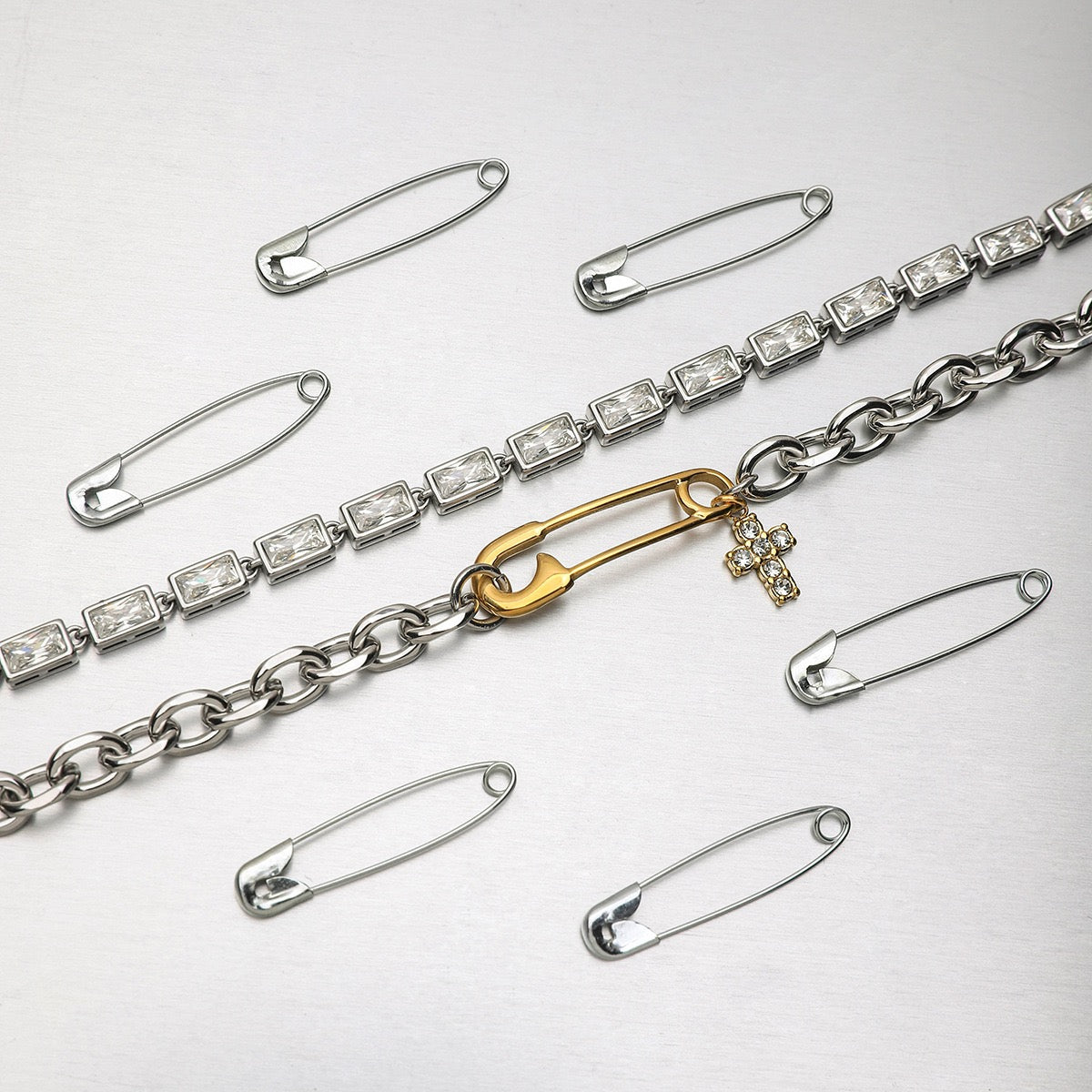 Two-Tone Cross & Safety Pin Pendant Bracelet