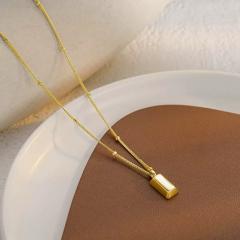 14K Gold Bar Necklace--A Symbol of Ambition & Value